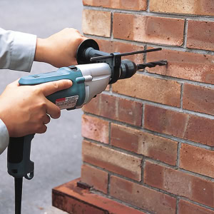 Masina de gaurit cu percutie 720W MAKITA HP2051H | Travandi.ro