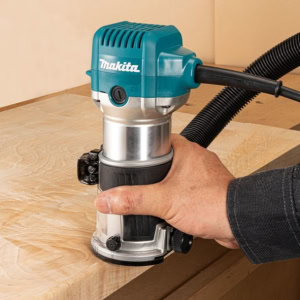 Masina de frezat verticala si unimanuala 6 mm/8 mm, 710 W MAKITA RT0702CX2 | Travandi.ro