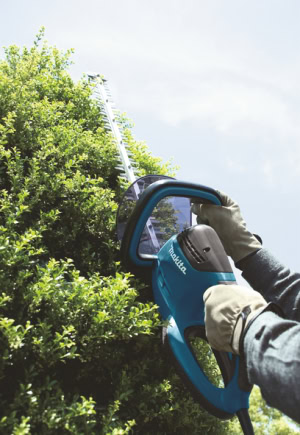 Masina de tuns gard viu cu motor electric 550W, 55 cm MAKITA UH5570 | Travandi.ro